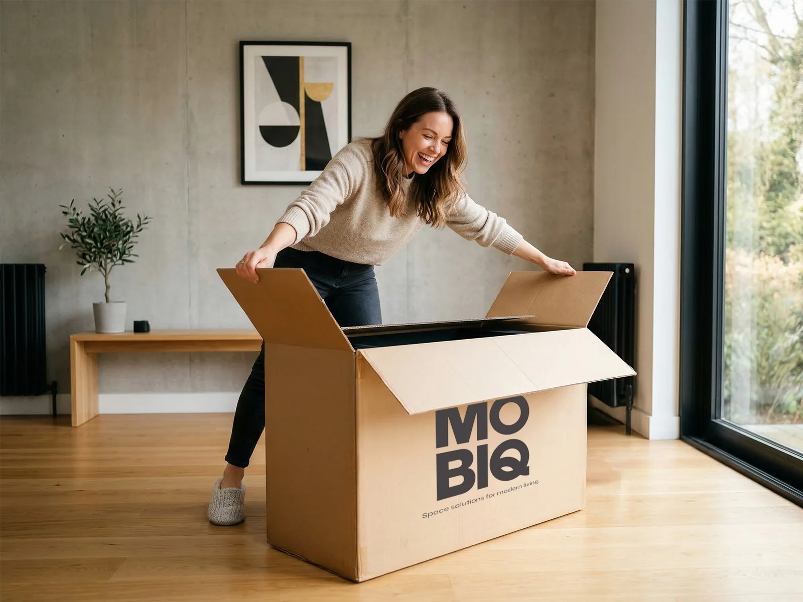 Espacio interior con mobiliario Mobiq — programa de distribuidores